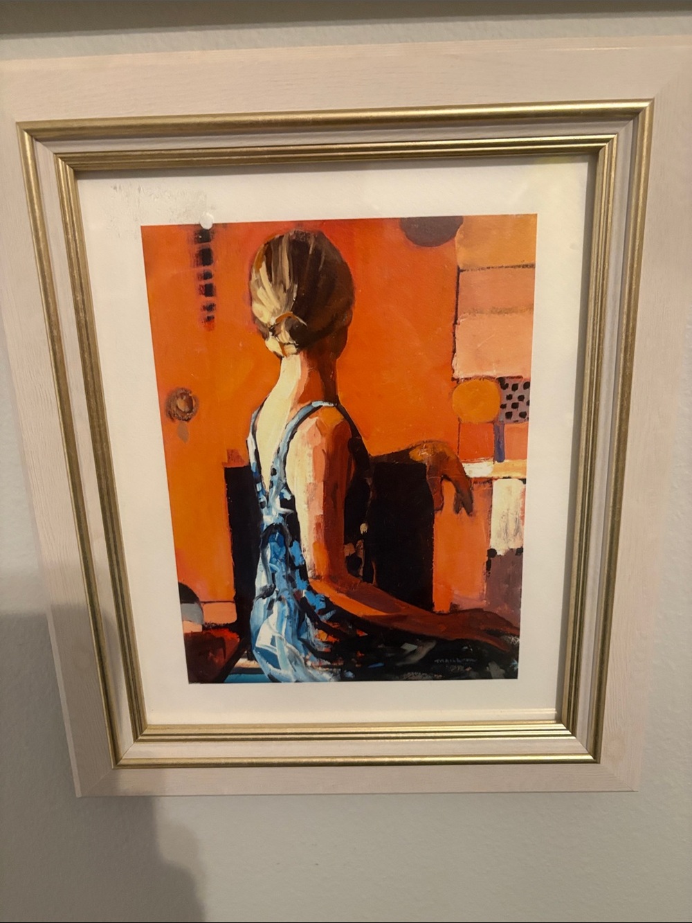 Anthropologie Woman in Blue Dress with Orange Backdrop